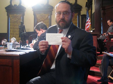 guy-holding-cue-card